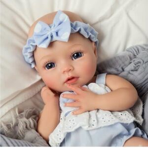 Sweet Silicone BABESIDE Baby Doll Girl Terry with Blue Outfit and Headband.